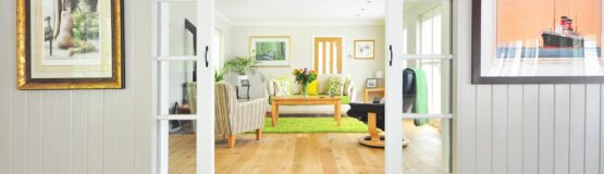 White door entryway with hardwood floor.